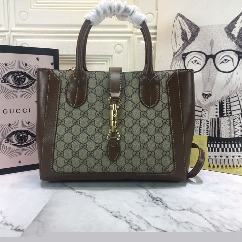 G*u*i shopping bags